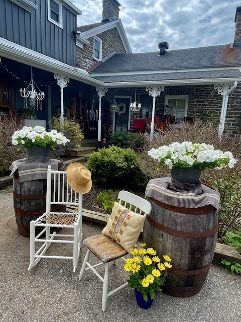 Barrels with flower pot kept on them